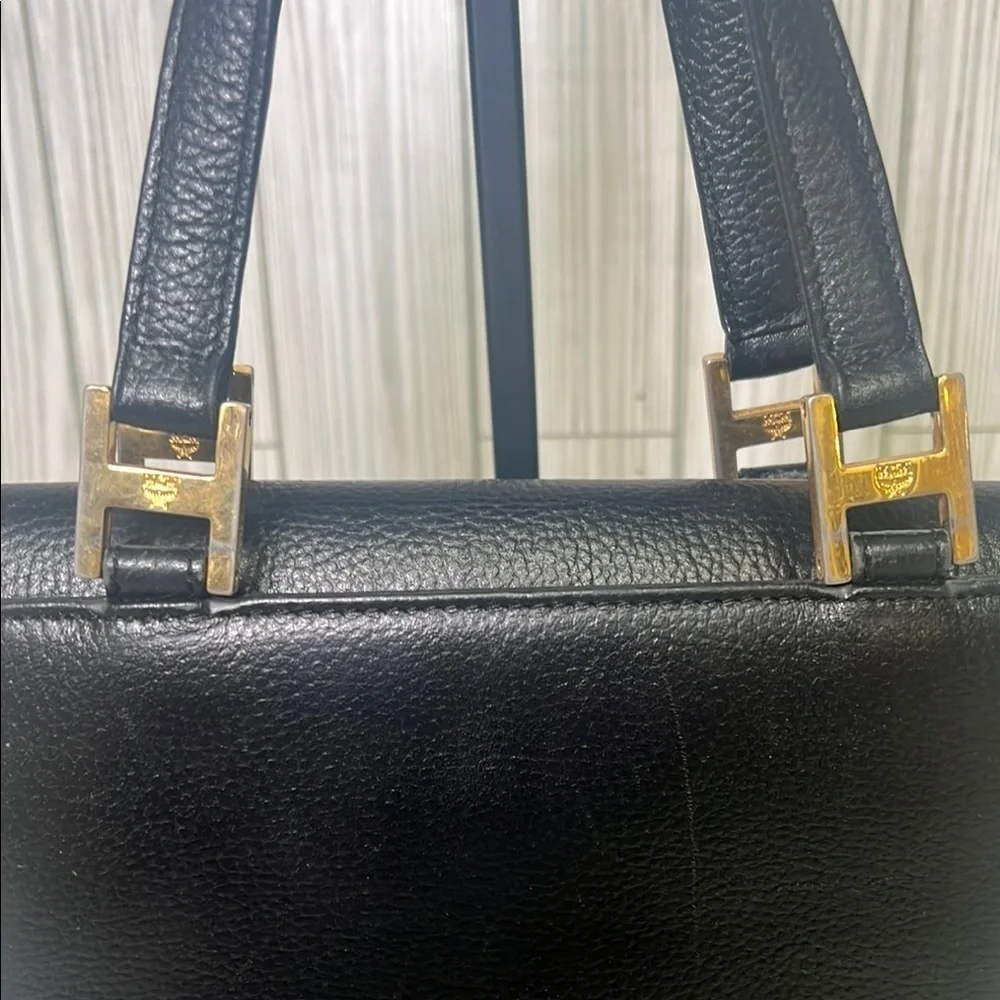 MCM Black Mini Tote with Gold Accents and Trapezoid Shape